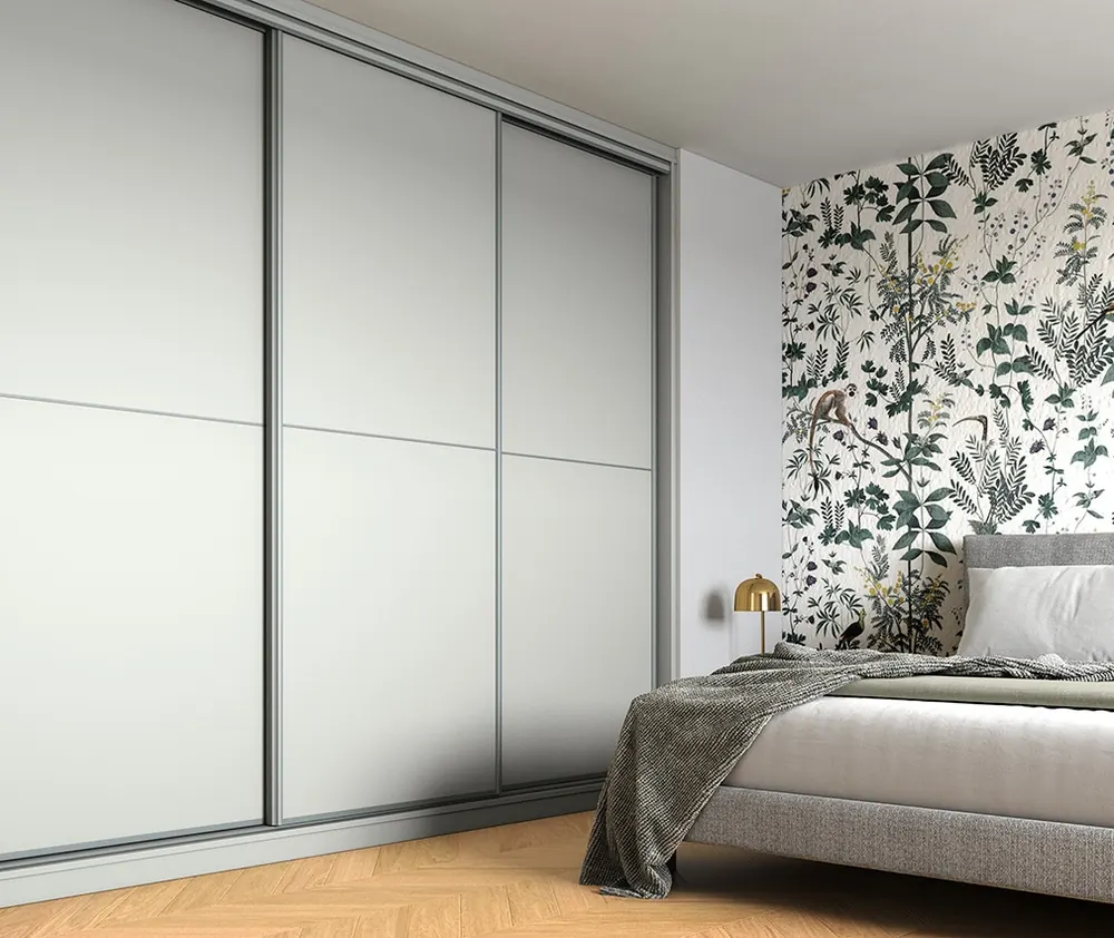 Chambre sur mesure dressing d'angle — blanc satiné, aménagé par Gitter à Hagondange (gammes Portéa)